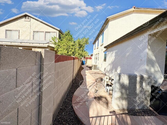 Foto del edificio - 4 br, 3.5 bath House - 13551 W San Juan Ave