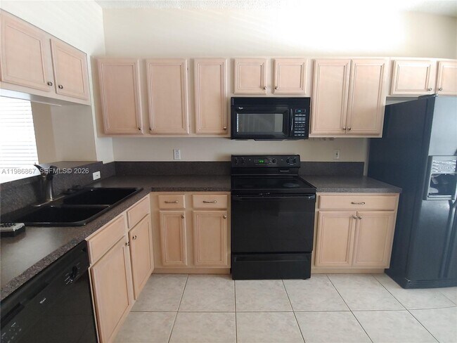 Foto del edificio - 5071 Palmbrooke Cir