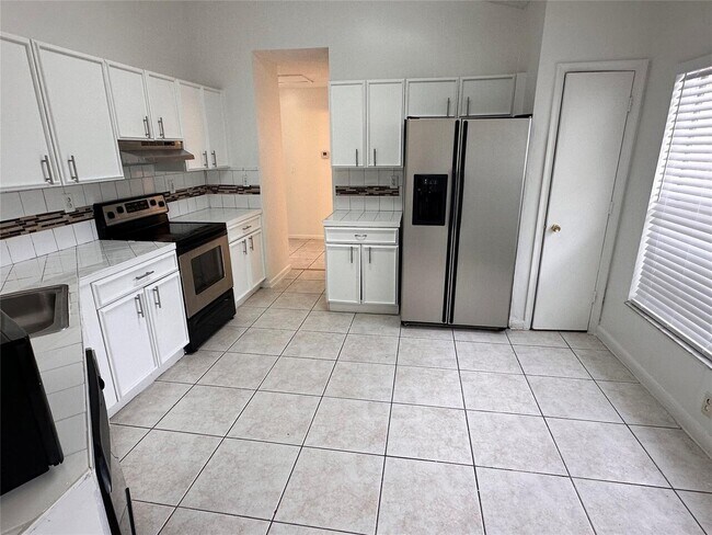 Building Photo - 5582 NW 184th Terrace