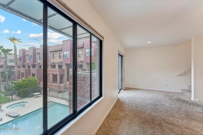 family room view of pool and interior courtyard - 330 S Farmer Ave