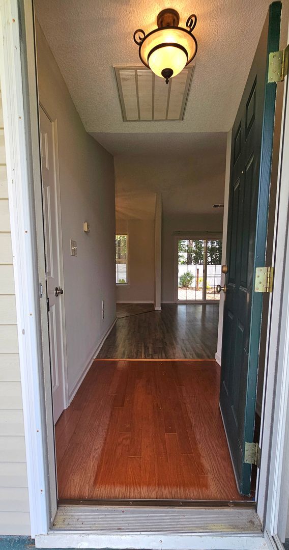 Building Photo - “Plantation Pines Living: Where Every Day ...