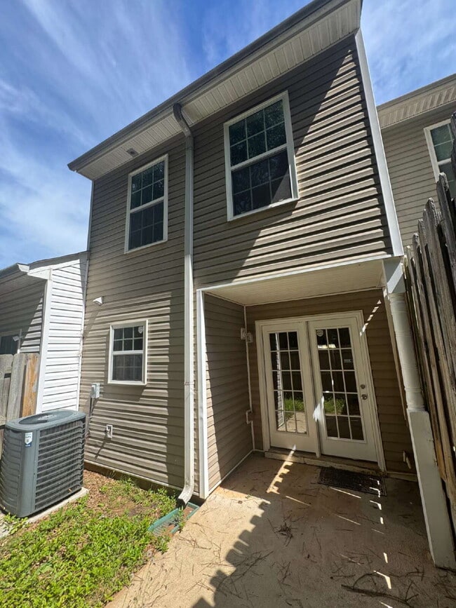 Photo - Built in 2004, this two-story townhouse in the Wellington Walk community offers 1,205 square feet...