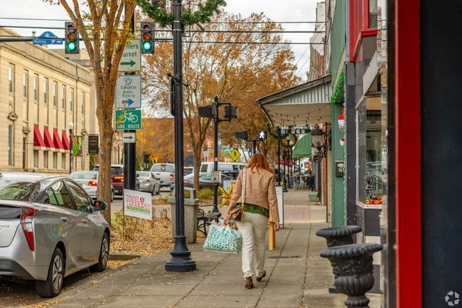 A person walks through historic Downtown Gallatin.