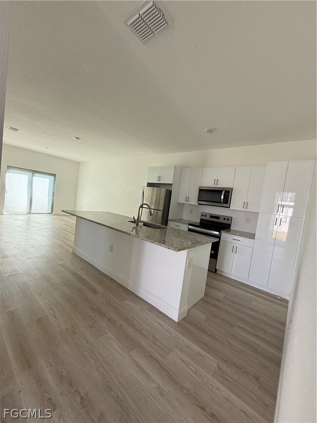 Building Photo - 1135 Harvest Ave