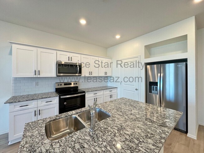 Foto del edificio - 18100 W Soft Wind Dr