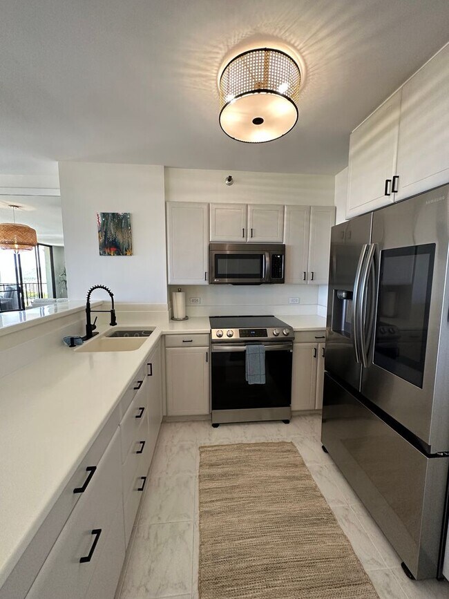 Foto del edificio - Stunning Panoramic Ocean Views! Fully furnished, fully renovated, 2 bedroom, 2 bathroom unit at W...