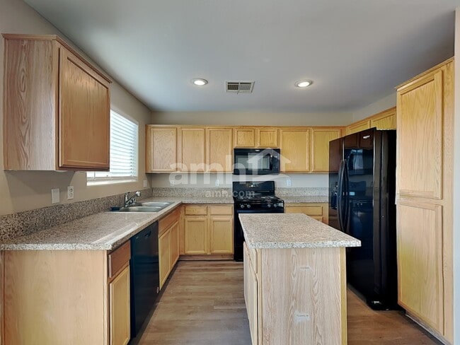 Foto del edificio - 8440 Walker Gardens Pl