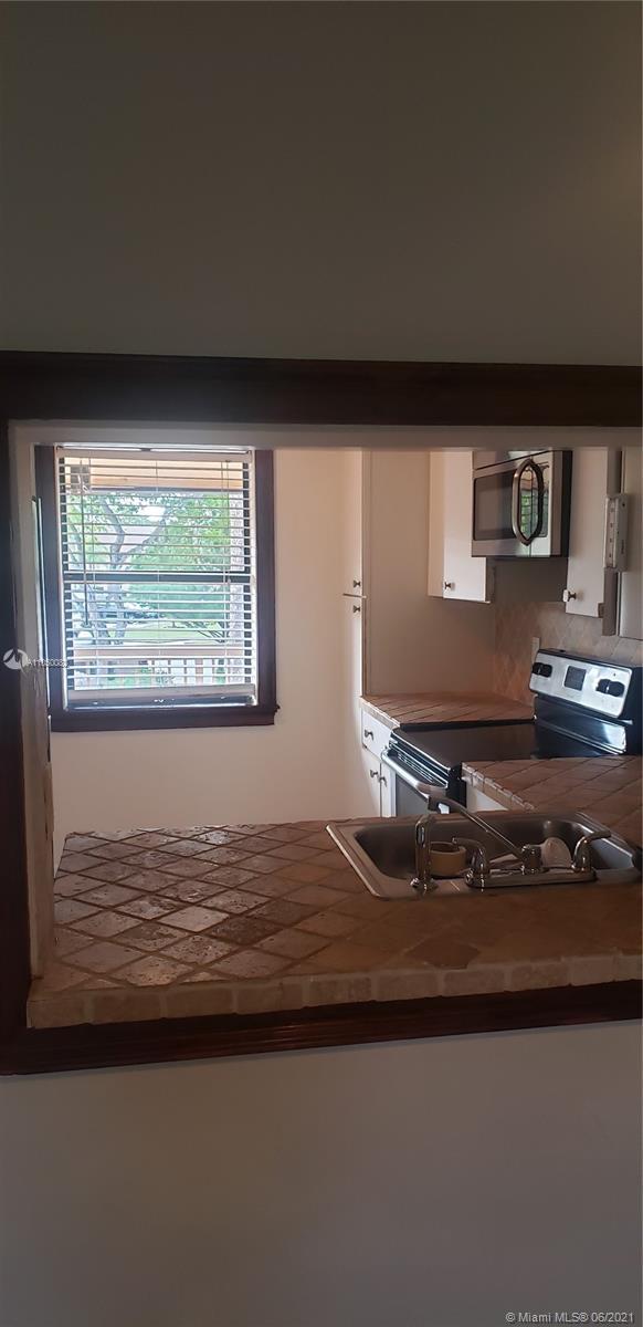 Building Photo - 4251 Carambola Cir S
