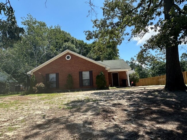 Building Photo - 3/2 No carpet & Fenced yard off Old Waynes...