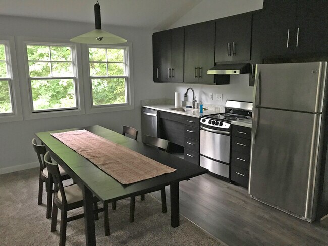Kitchen and Dining Area, table included - 706 Duncan St