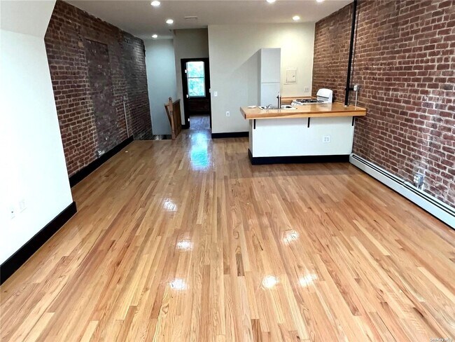 Building Photo - 68-06 Woodside Ave