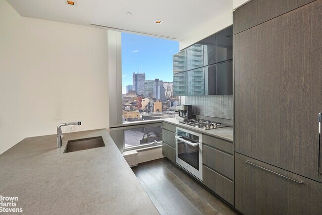 Building Photo - Furnished Sunny Luxury Living 1bd/1.5ba