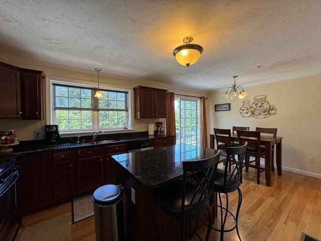 Building Photo - Updated Two-Bedroom Corner Townhouse in Lo...