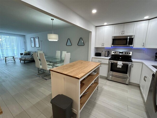 Building Photo - 19390 Collins Ave