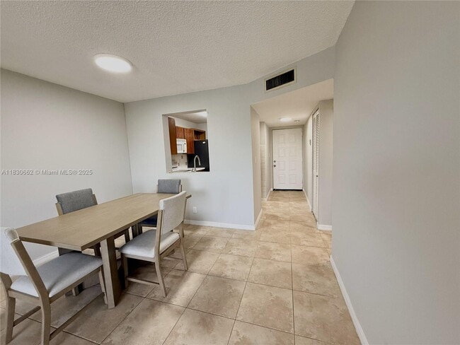 Building Photo - 8550 N Sherman Cir