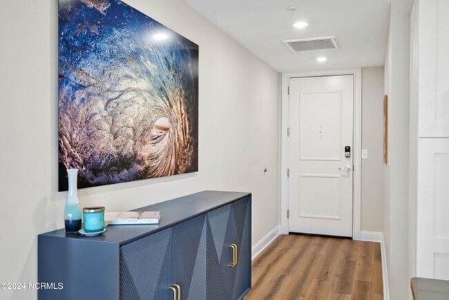 Building Photo - Welcome to your dream condo in the heart o...