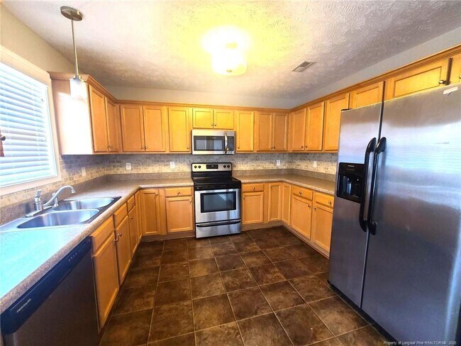 Foto del edificio - 2252 Cliff Swallow Drive