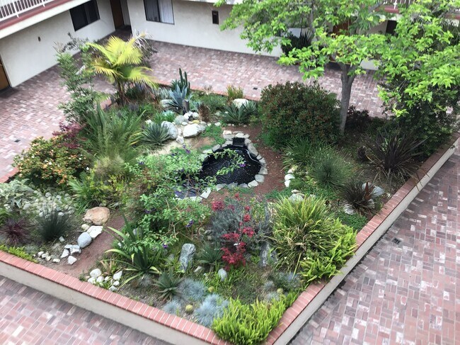 Open courtyard w/ fish pond - 2425 Purdue Ave