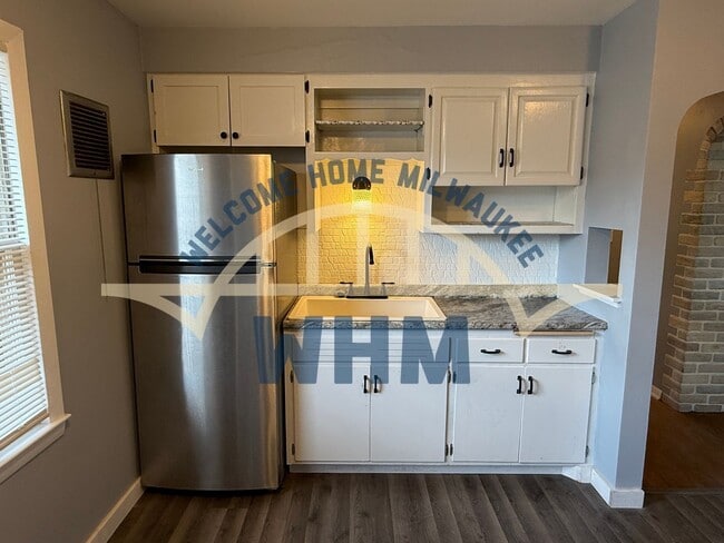 Building Photo - 4911 W Tesch Ave