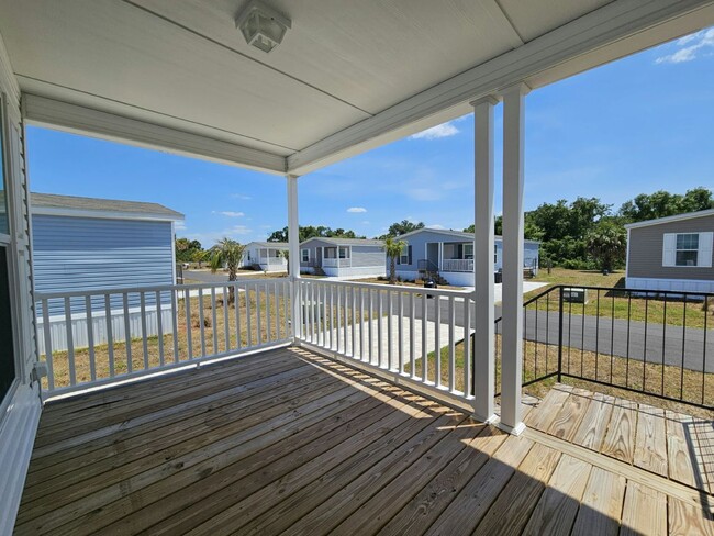 Foto del edificio - 6681 Hidden Oaks Dr