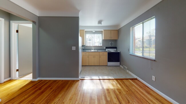 View into the Living Room and Kitchen - 118-120 N Center St-Walk to Everything V-Tour