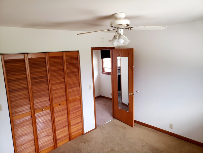 Spacious bedroom with good closet space for your clothing plus storage - 609 S Main St