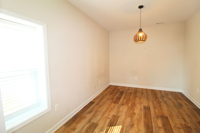 Building Photo - Spacious 4 Bedroom, 3.5 Bath Townhome with...