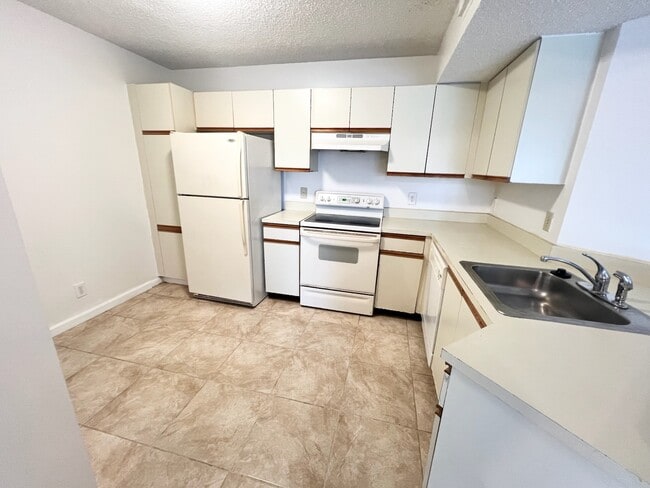 Photo - 8977 Wiles Rd Townhome