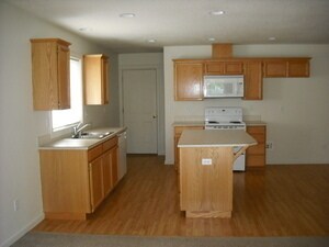 Building Photo - Charming 4-Bedroom Home in the Heart of Orchards!