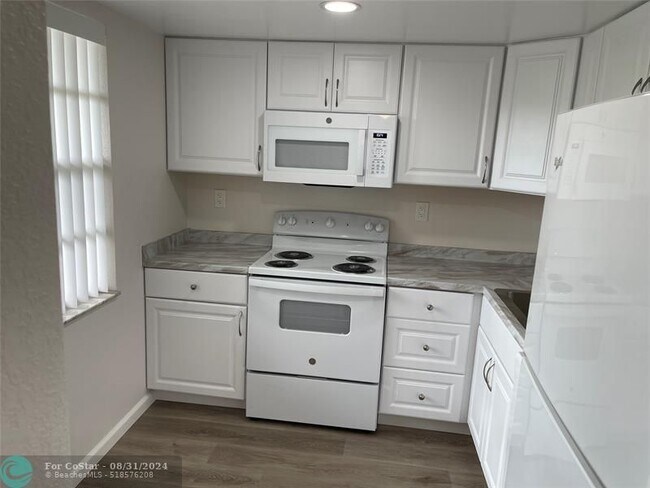 Building Photo - 3099 NW 48th Ave