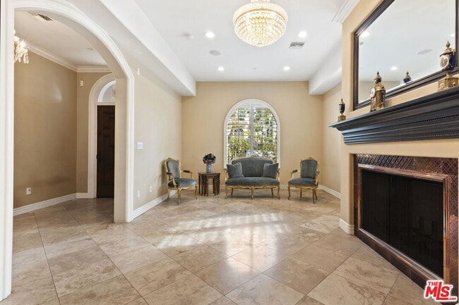 Building Photo - 349 S La Peer Dr