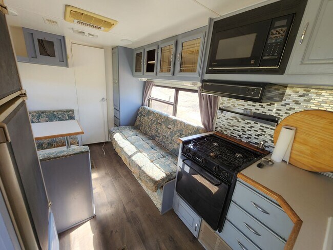 Building Photo - Work for rent as a caretaker of property a...