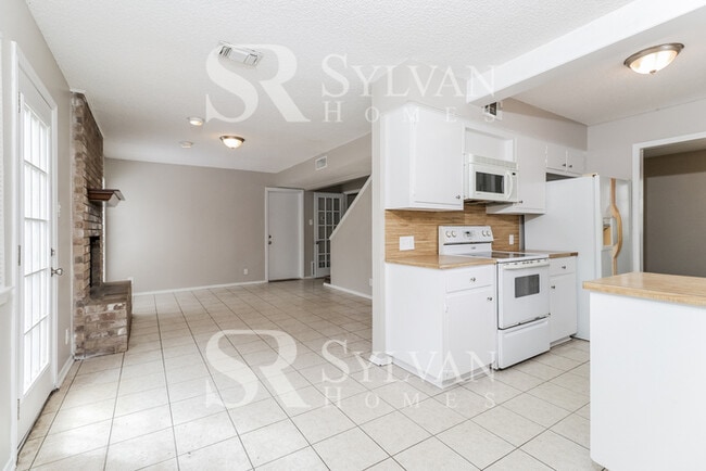 Building Photo - Turn the key. Enter. Smile. Repeat every day!