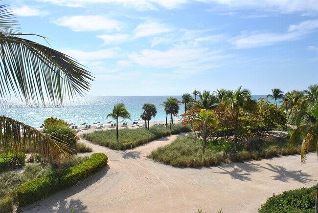 Building Photo - 9801 Collins Ave