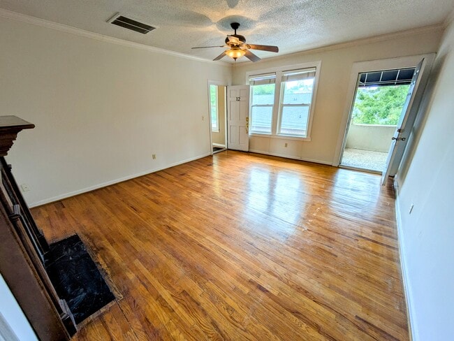 Living area with access to private balcony - 801 E North St