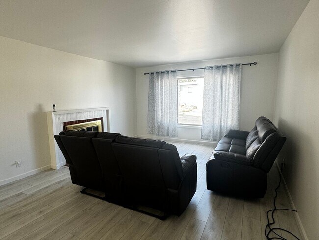 Building Photo - Light-Filled Living in this Charming 4-Bed...