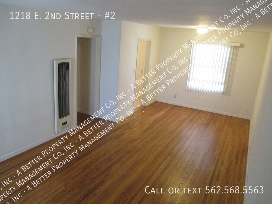 Primary Photo - Lower gated 1 bed w/hardwood floors & onsi...