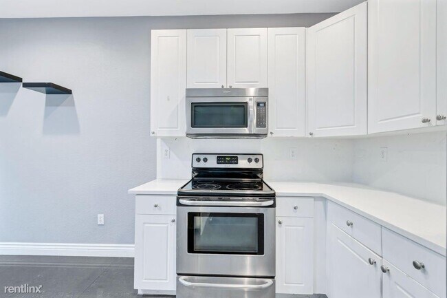 Building Photo - 3 br, 2.5 bath House - 3122 Merrick Ter # ...