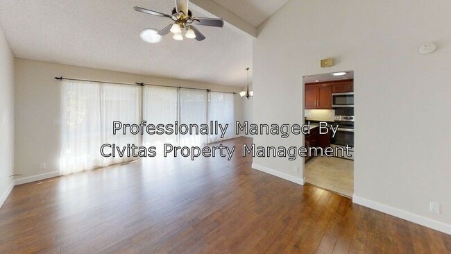 Building Photo - Bright spacious townhome available now