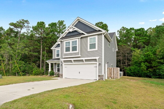 Building Photo - Spacious 4-Bedroom Retreat with 2.5 Baths ...