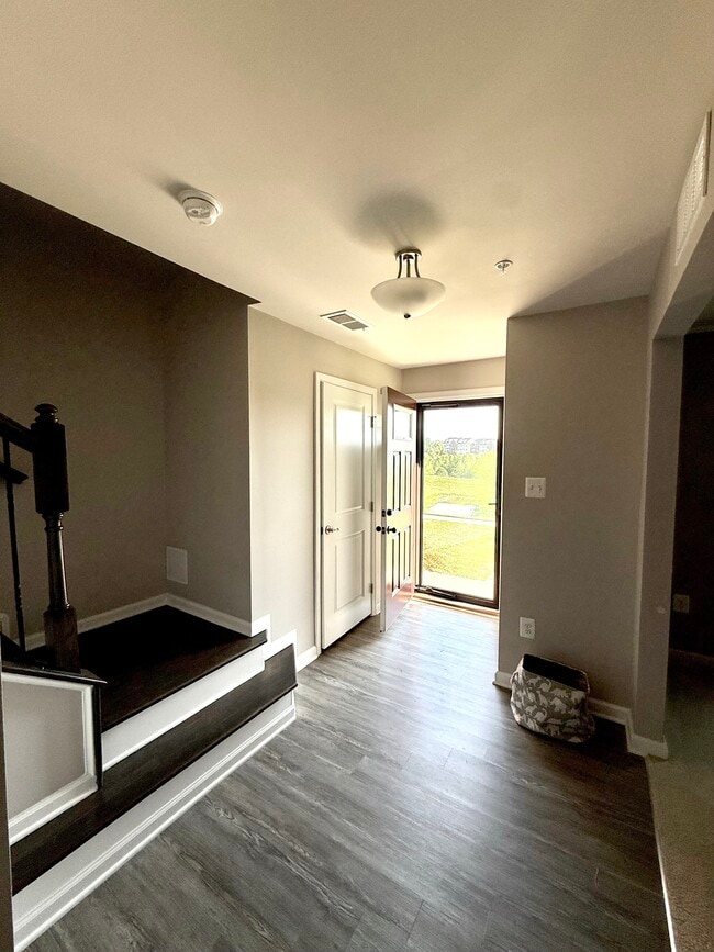 Front entrance with storm door - 5907 Duvel St