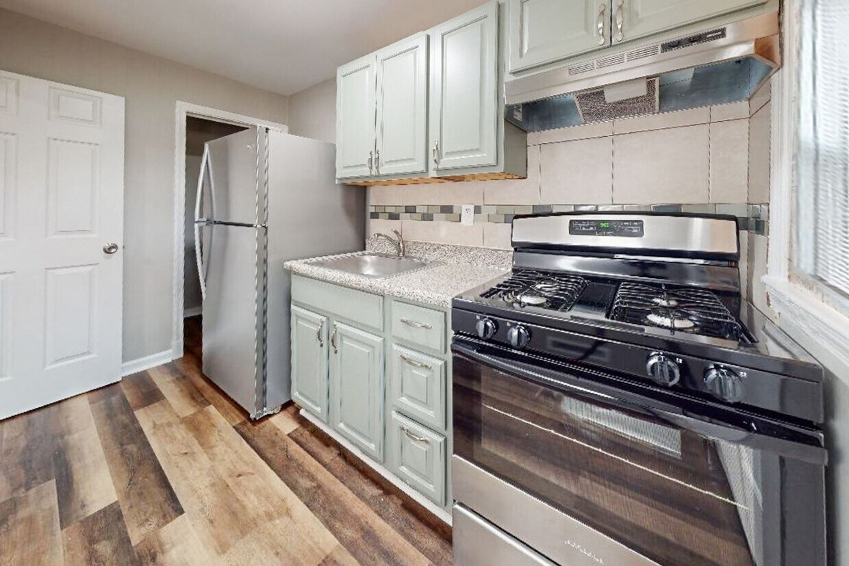 Primary Photo - Renovated, Finished Basement & Fenced Back...