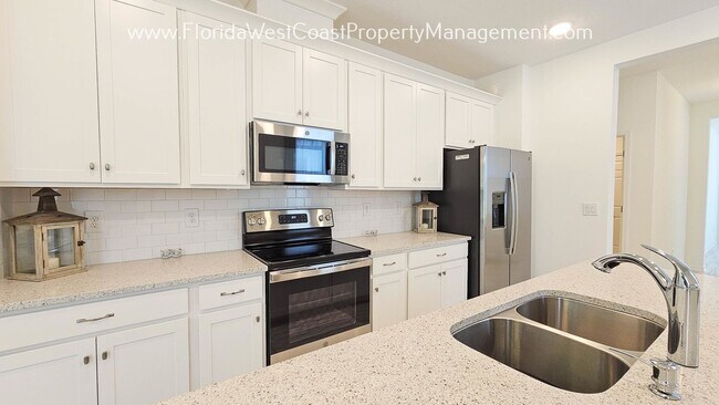 Foto del edificio - OUTSTANDING SUMMERWOODS -PARRISH 3 BEDROOM...