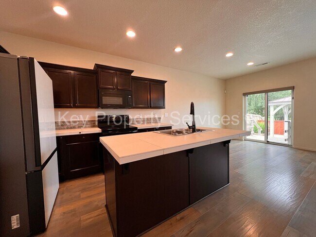 Building Photo - Orchards Two-Story with Fenced Yard and Gazebo