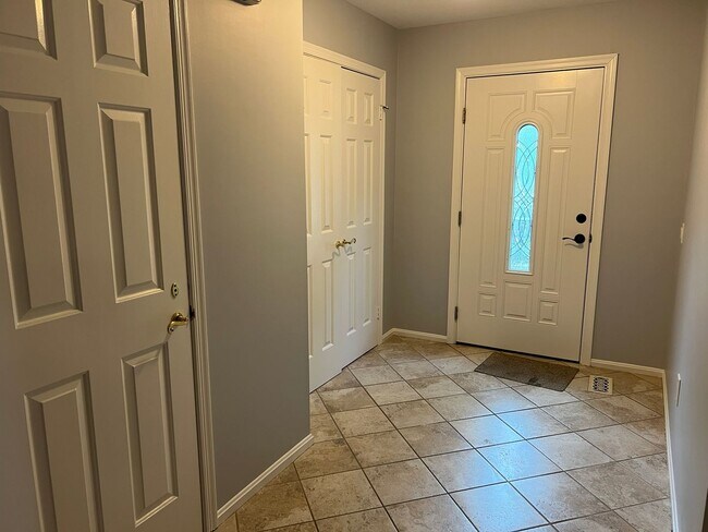 Building Photo - Stunning Three Finished Level Townhome Clo...