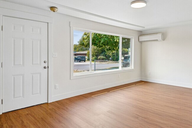 Building Photo - Updated Home with Large Detached Garage & Off-Street Parking