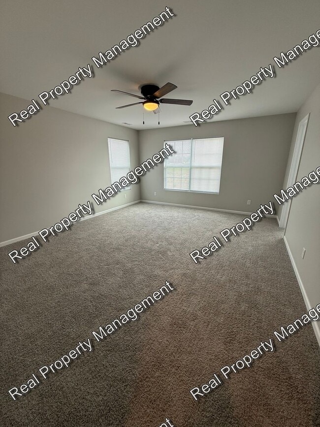 Building Photo - New Construction 3 Bedroom Townhome
