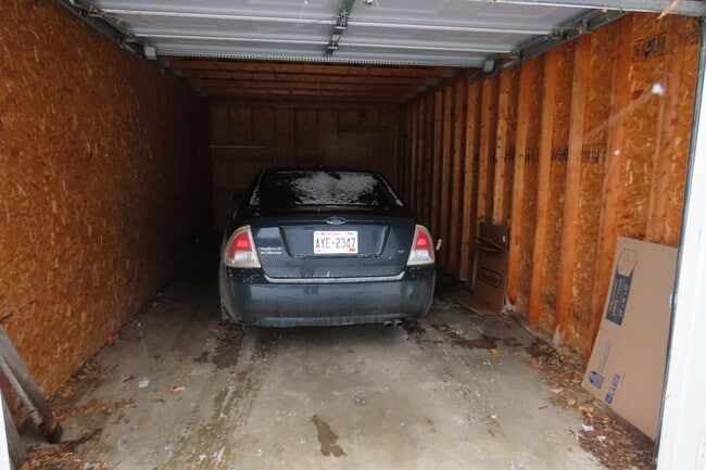 room for 1 car is devided from other side - 2025 S Main St