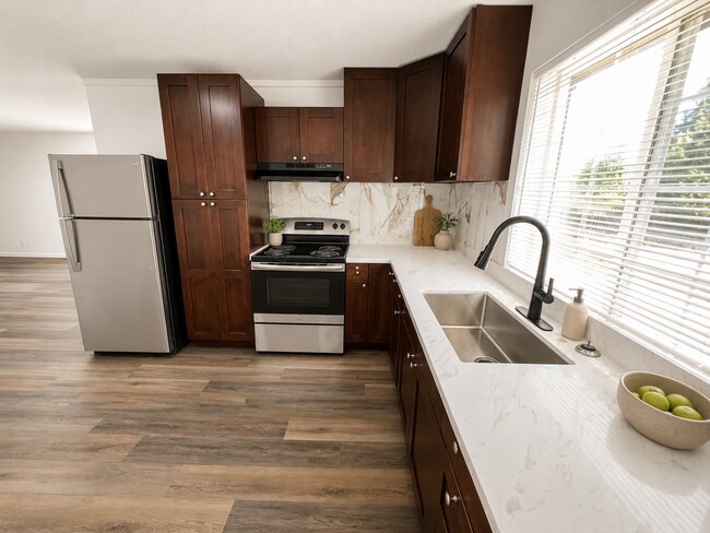 Building Photo - Elevated 3-Bedroom Home with Secure Garage & Cozy Living Space