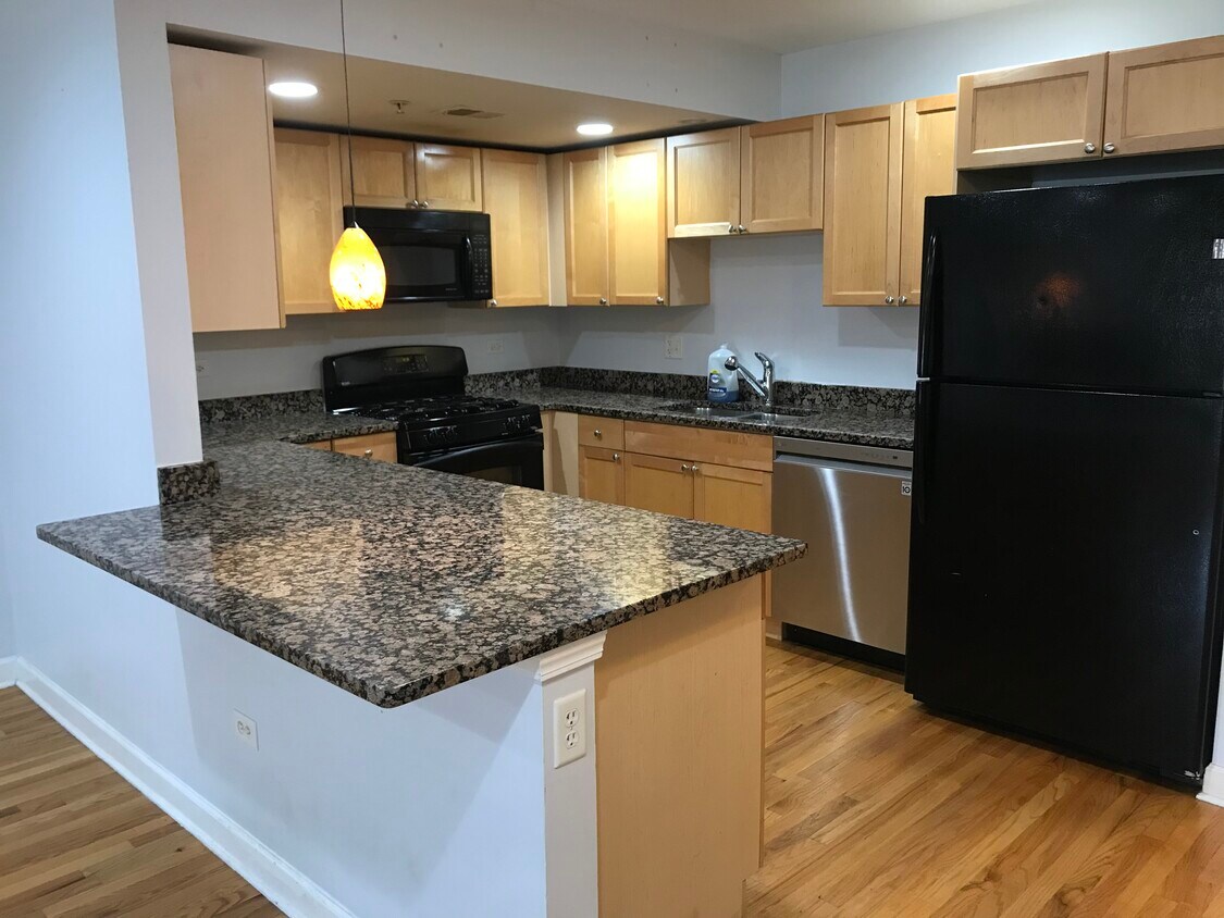 Kitchen w/ Island Seating - 7711 W Westwood Dr